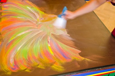 Tibetan Buddhist Monk Sweeping up a Medicine Buddha Sand Mandala after Completion during a Fundraising Visit to the UK, Swansea, South Wales by Unbekannt Unbekannt